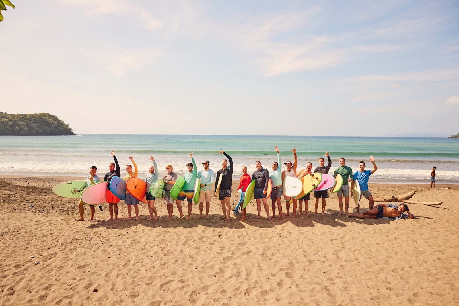 Rainbow Surf Retreats group on the beach